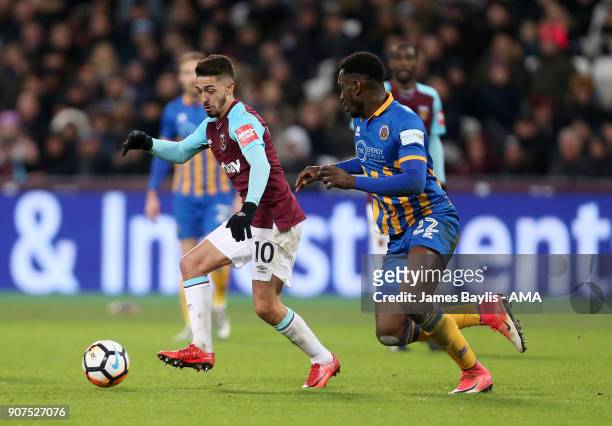 Manuel Lanzini of West Ham United and Aristote Nsiala of Shrewsbury Town during the Emirates FA Cup Third Round Repaly match between West Ham United...