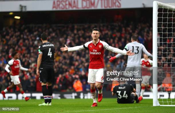 Laurent Koscielny of Arsenal celebrates after scoring his sides third goal during the Premier League match between Arsenal and Crystal Palace at...