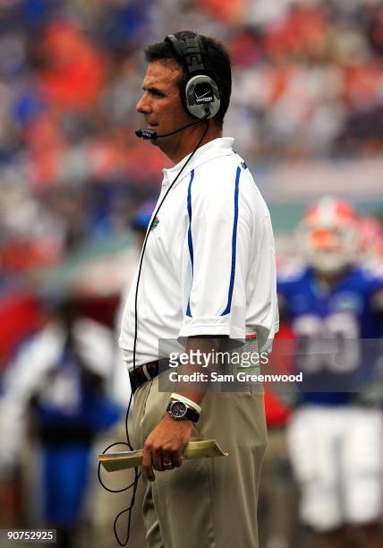Head coach Urban Meyer watches the action during the game against the Troy Trojans at Ben Hill Griffin Stadium on September 12, 2009 in Gainesville,...