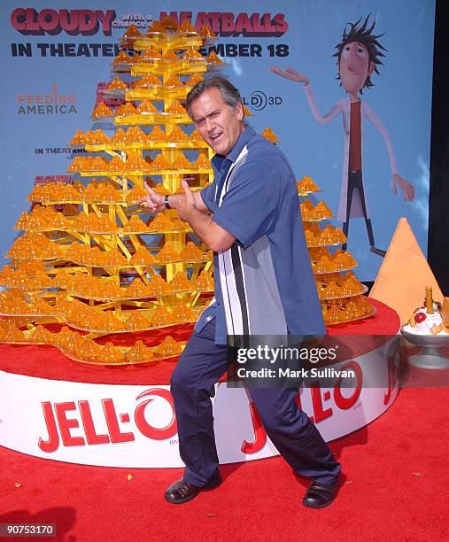 Actor Bruce Campbell poses in front of a Jell-O Castle at Mann Village Theatre on September 14, 2009 in Westwood, Los Angeles, California.