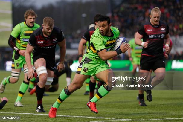 Nafi Tuitavake of Northampton Saints runs in to score their second try during the European Rugby Champions Cup match between Saracens and Northampton...