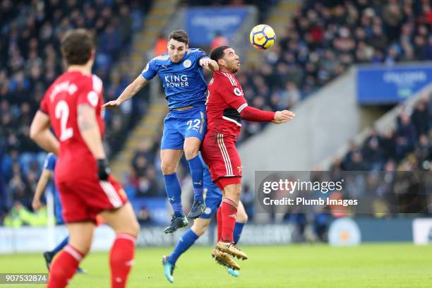 Matty James of Leicester City in action with Troy Deeney of Watford during the Premier League match between Leicester City and Watford at King Power...