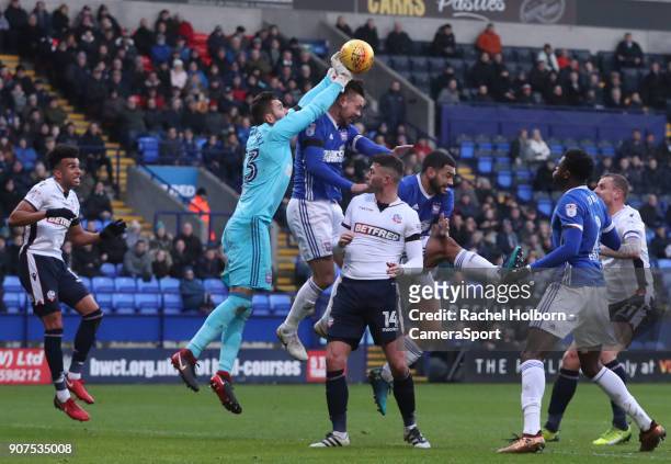 Ipswich Town's Bartosz Bialkowski makes a save under pressure from Bolton Wanderers' Gary Madine during the Sky Bet Championship match between Bolton...