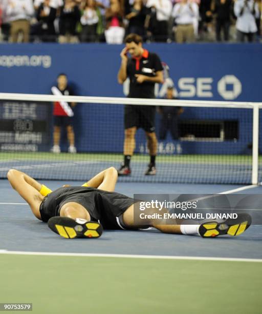 Tennis player Juan Martin Del Potro from Argentina celebrates after beating Roger Federer from Switzerland during the final of the 2009 US Open at...