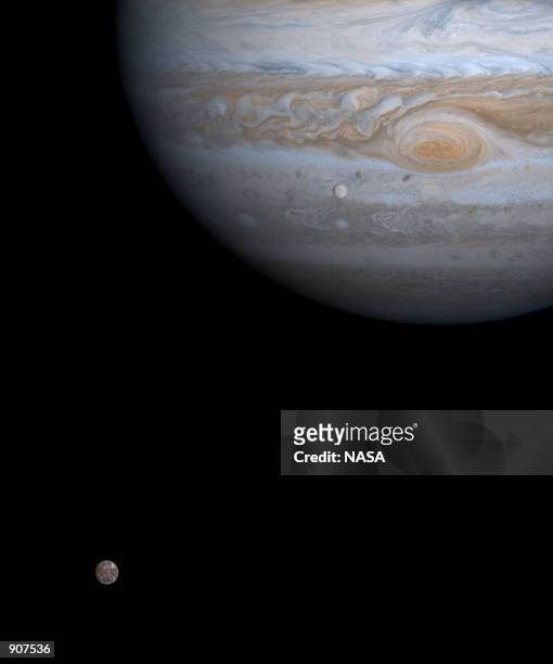 The solar system's largest moon, Ganymede, is captured here alongside the planet Jupiter in this picture taken by NASA's Cassini spacecraft, December...