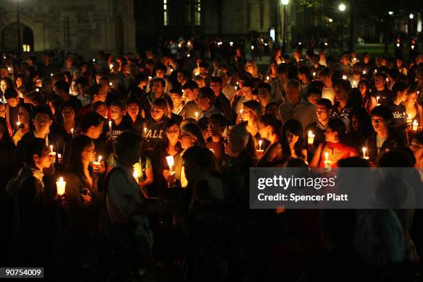 Yale students attend a candlelight vigil for fellow student Annie Le whose body was found behind a wall yesterday night in a laboratory building near...