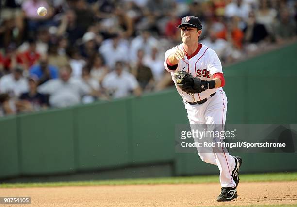 Nick Green of the Boston Red Sox throws to first during the game against the Oakland Athletics at Fenway Park on July 30, 2009 in Boston,...