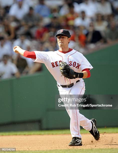 Nick Green of the Boston Red Sox throws to first during the game against the Oakland Athletics at Fenway Park on July 30, 2009 in Boston,...