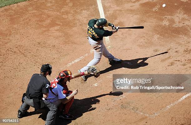 Nomar Garciaparra of the Oakland Athletics at bat against the Boston Red Sox at Fenway Park on July 30, 2009 in Boston, Massachusetts The Red Sox...