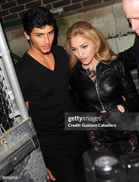 Model Jesus Luz and Madonna attend Marc Jacobs Spring 2010 at the NY State Armory on September 14, 2009 in New York City.