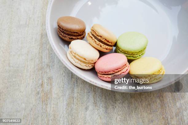 high angle view of macaroons on a plate - cauterets stock pictures, royalty-free photos & images