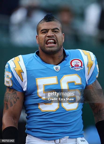 Shawne Merriman of the San Diego Chargers looks on during warm-ups against the Oakland Raiders on September 14, 2009 at the Oakland-Alameda County...