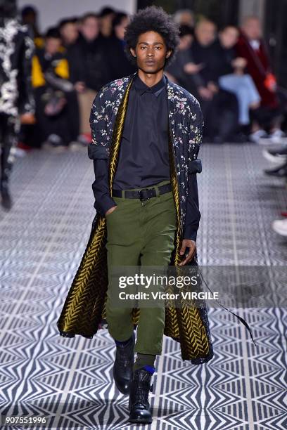 Model walks the runway during the Haider Ackermann Menswear Fall/Winter 2018-2019 show as part of Paris Fashion Week on January 17, 2018 in Paris,...