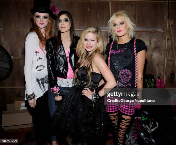 Singer Avril Lavigne is surrounded by her models at the STYLE360's presentation of Abbey Dawn by April Lavigne Spring 2010 at the Metropolitan...