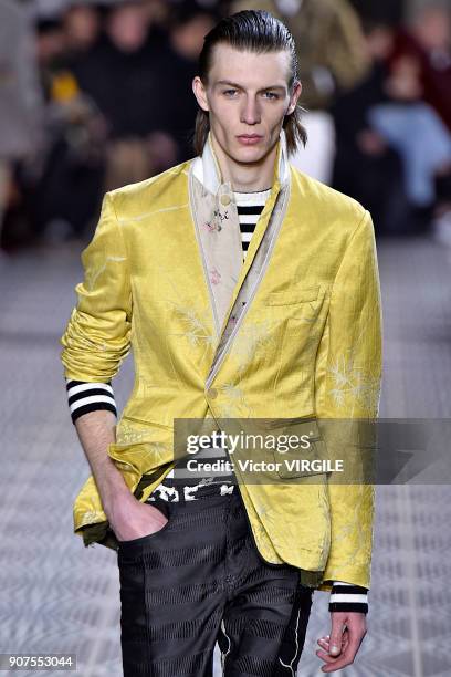 Model walks the runway during the Haider Ackermann Menswear Fall/Winter 2018-2019 show as part of Paris Fashion Week on January 17, 2018 in Paris,...