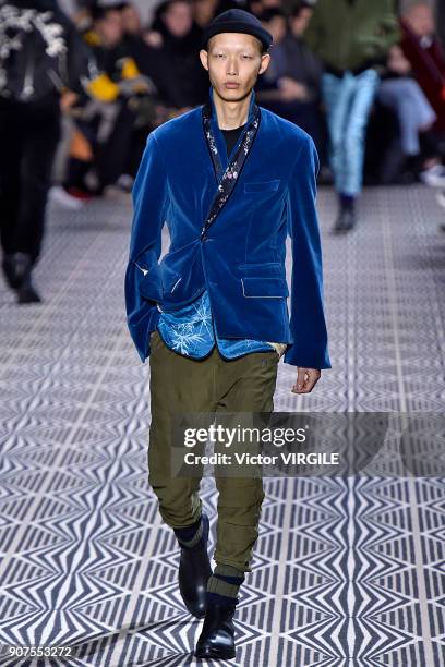 Model walks the runway during the Haider Ackermann Menswear Fall/Winter 2018-2019 show as part of Paris Fashion Week on January 17, 2018 in Paris,...