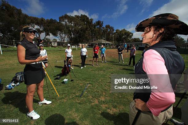 Player Jill McGill of the USA and Golf Instructor Dana Bates speak during Fortune Magazine Clinic at the LPGA Samsung World Championship on September...