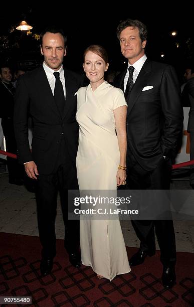 Director Tom Ford, actress Julianne Moore and actor Colin Firth pose at the "A Single Man" screening during the 2009 Toronto International Film...