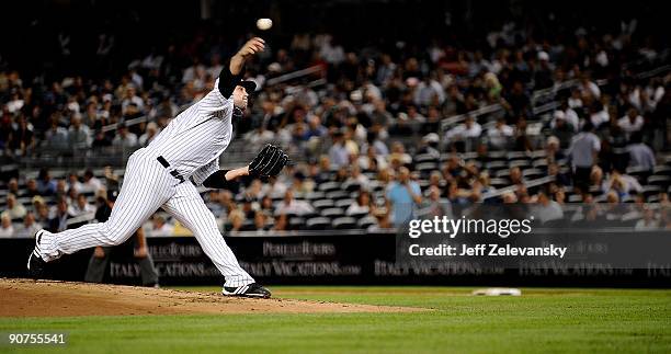 Joba Chamberlain of the New York Yankees delivers in the first inning of a game against the Los Angeles Angels of Anaheim at Yankee Stadium on...