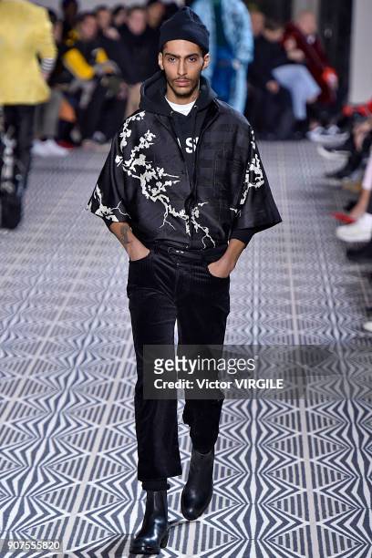 Model walks the runway during the Haider Ackermann Menswear Fall/Winter 2018-2019 show as part of Paris Fashion Week on January 17, 2018 in Paris,...