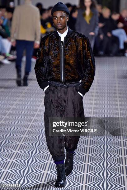 Model walks the runway during the Haider Ackermann Menswear Fall/Winter 2018-2019 show as part of Paris Fashion Week on January 17, 2018 in Paris,...