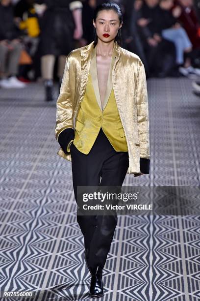 Model walks the runway during the Haider Ackermann Menswear Fall/Winter 2018-2019 show as part of Paris Fashion Week on January 17, 2018 in Paris,...