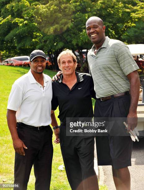 Scooter McGruder, Michael Bolton and Herb Williams attend the Michael Bolton Charities Celebrity Golf Outing at the Rockrimmon Country Club on...