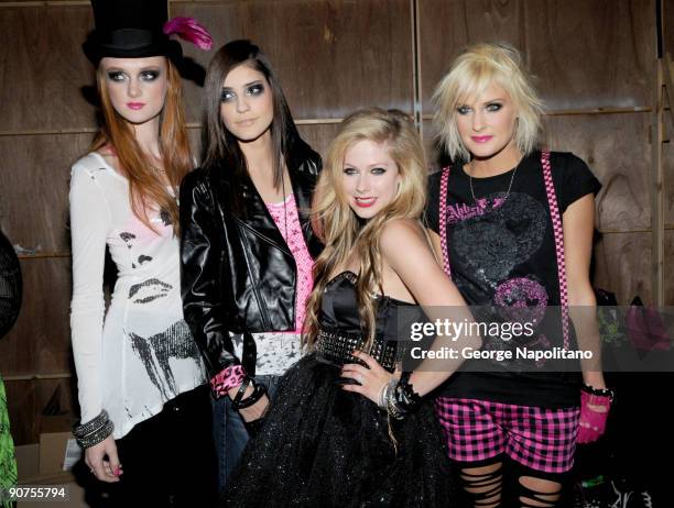 Singer Avril Lavigne is surrounded by her models at the STYLE360's presentation of Abbey Dawn by April Lavigne Spring 2010 at the Metropolitan...