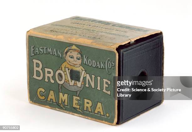 Kodak 'Brownie' box camera with original cardboard packing carton, made by Eastman Kodak Co. The camera was literally a cardboard box with a wooden...
