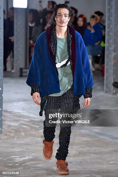 Model walks the runway during the Facetasm Menswear Fall/Winter 2018-2019 show as part of Paris Fashion Week on January 17, 2018 in Paris, France