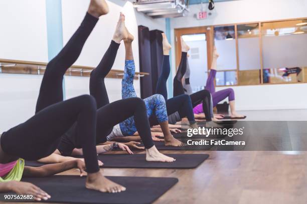 women working out together at modern gym - hesitant to dance stock pictures, royalty-free photos & images