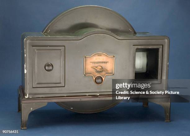 The original Baird �Televisors� were made with mahogany cabinets and were very expensive. This later �tin box� model was designed for Baird by Percy...