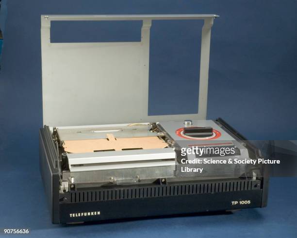 Videodisc player, shown open. The idea of a videodisc system was developed by Teldec . The advantage of a disc is that it's cheaper and faster to...