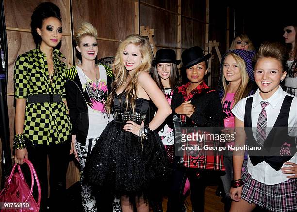 Singer Avril Lavigne is surrounded by her models at the STYLE360's presentation of Abbey Dawn by April Lavigne Spring 2010 at the Metropolitan...