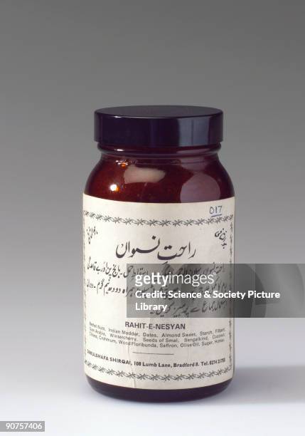 Glass bottle of Rahit-e-nesyan Unani medicine containing Bethel nuts; Indian madder; dates; almond sweet; starch; filbert; gum Arabia; wintercherry;...