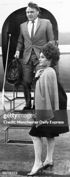 ?From the actress who hates heights came these words yesterday: "Flying is lovely." Hardly surprising, since Elizabeth Taylor had just stepped out of...