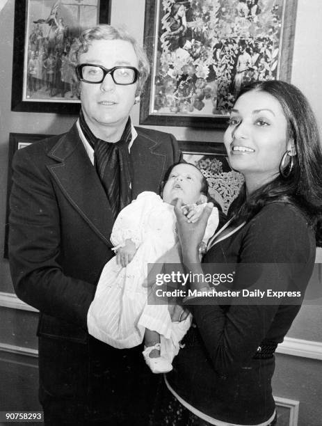 British film star Michael Caine with his wife Shakira and baby daughter Natasha.