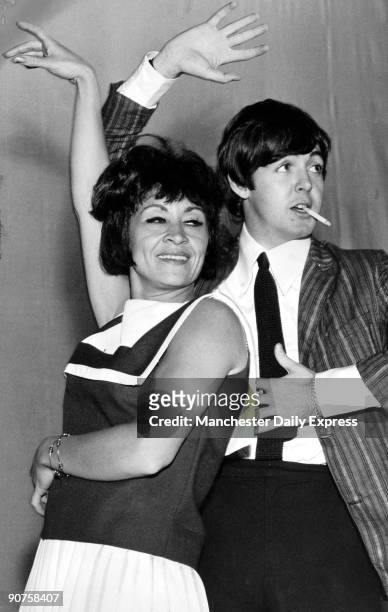 Beatle McCartney on stage with singer Hispano-American Chita Rivera.