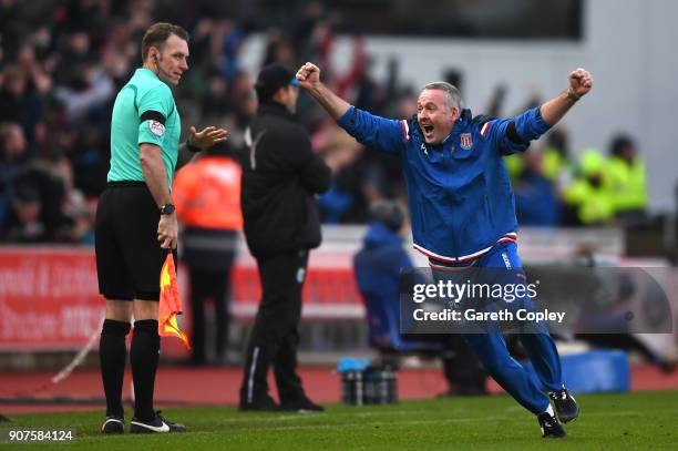 Paul Lambert, Manager of Stoke City celebrates during the Premier League match between Stoke City and Huddersfield Town at Bet365 Stadium on January...