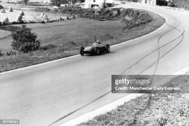 The corner where Moss lost his wheel and came off the track. The car practising after the accident is a Ferrari driven by Belgian Willy Mairesse....