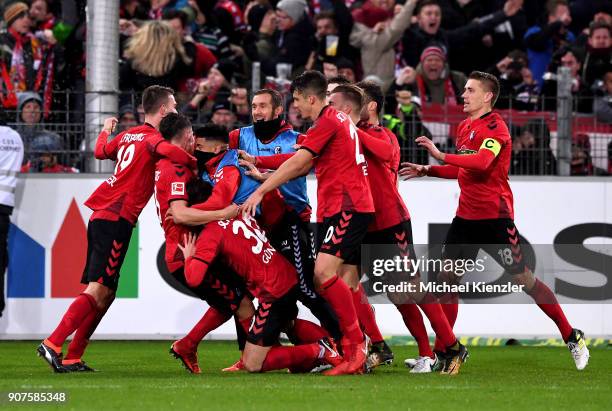 Players of SC Freiburg celebrate 2:1 of Robin Koch during the Bundesliga match between Sport-Club Freiburg and RB Leipzig at Schwarzwald-Stadion on...