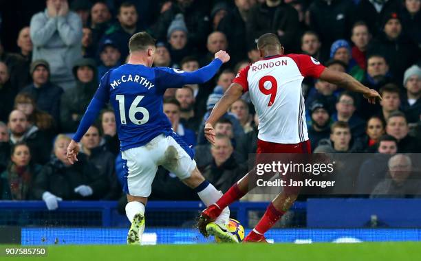 Jose Salomon Rondon of West Bromwich Albion tackles James McCarthy of Everton during the Premier League match between Everton and West Bromwich...