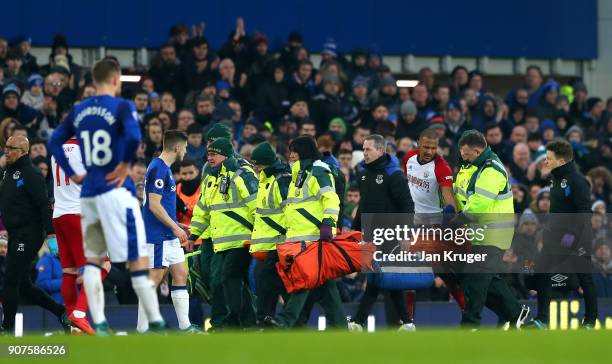 James McCarthy of Everton is taken off on a stretcher during the Premier League match between Everton and West Bromwich Albion at Goodison Park on...