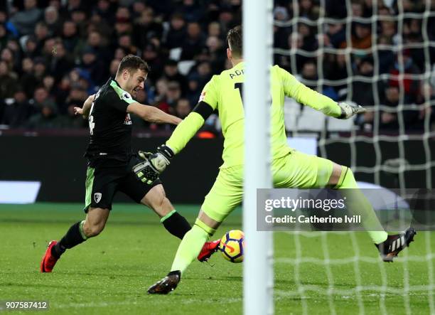 Ryan Fraser of AFC Bournemouth scores his sides first goal past Adrian of West Ham United during the Premier League match between West Ham United and...