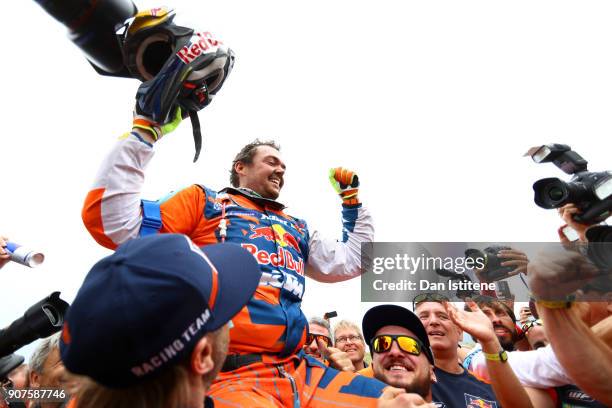 Matthias Walkner of Austria and Red Bull KTM celebrates victory at the end of stage fourteen of the 2018 Dakar Rally, a loop stage to and from...