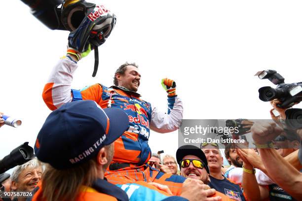 Matthias Walkner of Austria and Red Bull KTM celebrates victory at the end of stage fourteen of the 2018 Dakar Rally, a loop stage to and from...
