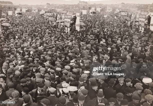 Photograph by Horace W Nicholls, two similar views of crowds, possibly at a racing event such as the Derby at Epsom. "