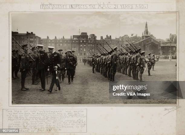 Gelatin silver print. Photograph by Horace W Nicholls, of the men of the 'Westmeath' being inspected by King George V at Armoury House in London. The...