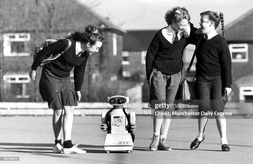 Schoolgirls with robot, Mandale Middle School, Bradford, February 1989.