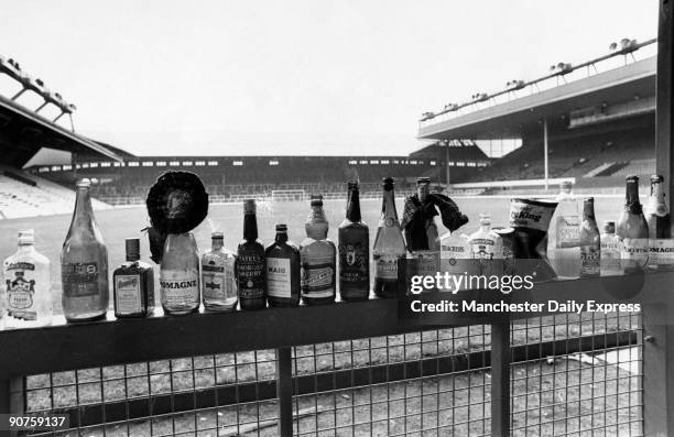 Empty bottles left by fans after a World Cup qualifying match between Scotland and Wales. Drinks include: Pomagne, cider, Smirnoff vodka, Cointreau,...